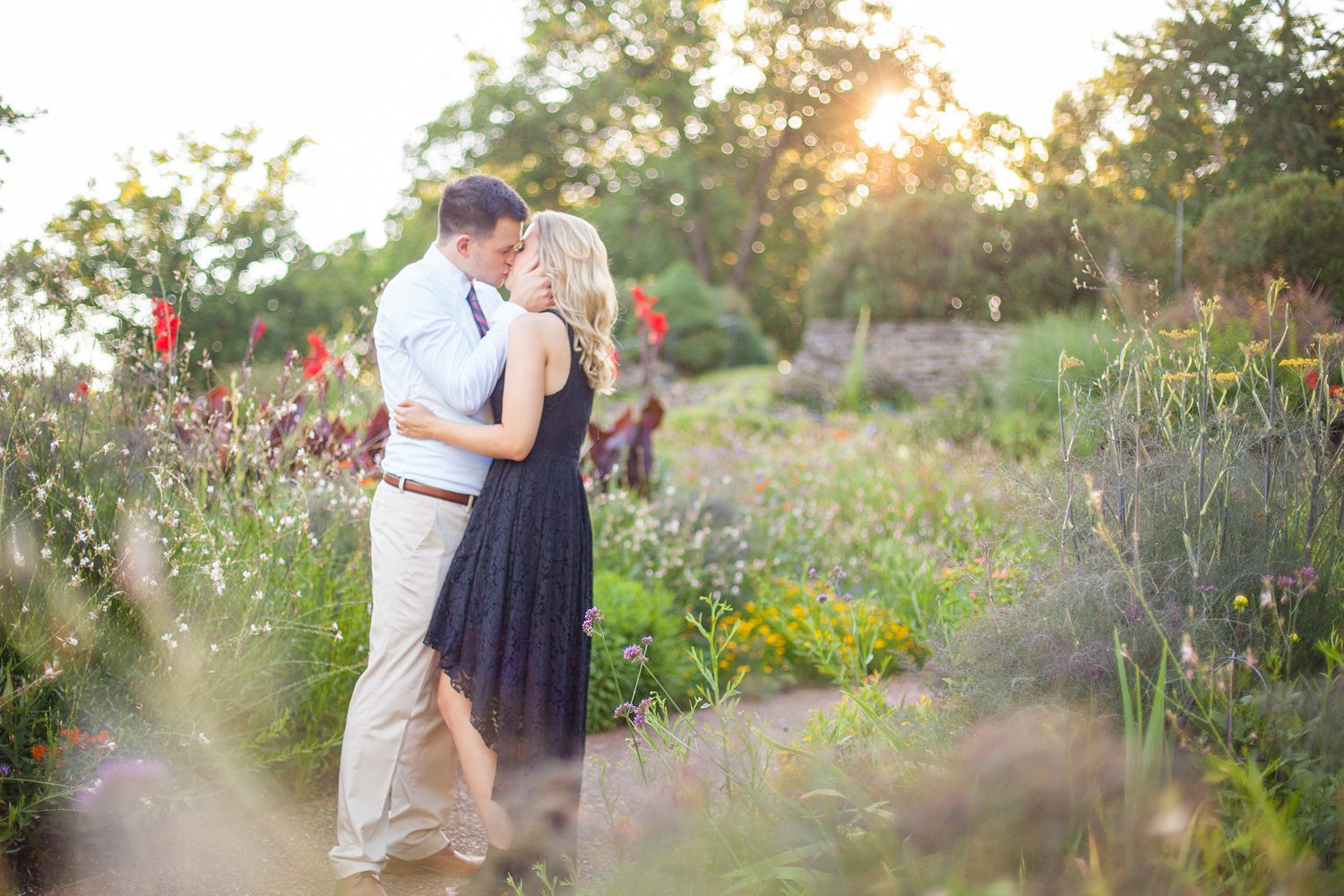 couple at wildflower gardens for engagement session at cheekwood estate and gardens photo by krista lee photography