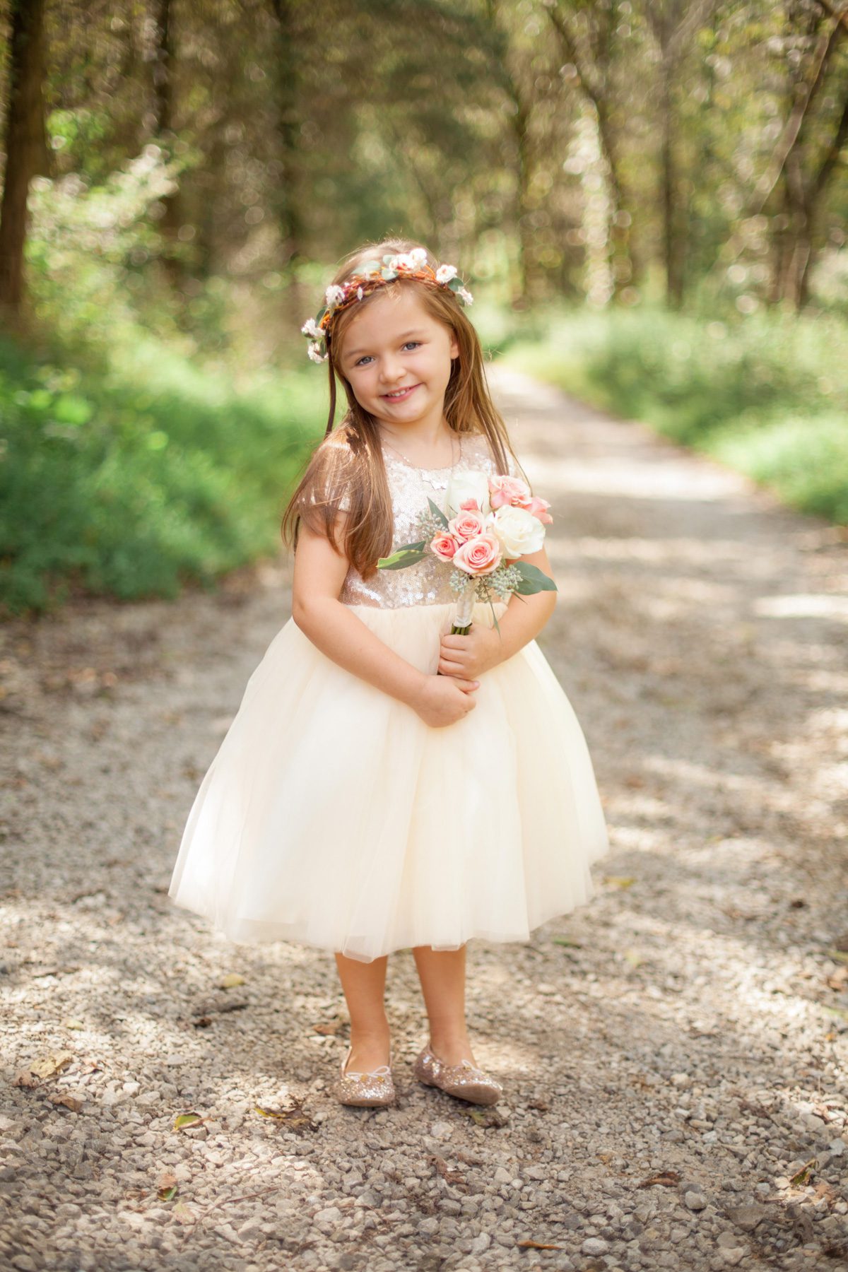 Flower girl on wedding day at Butterfly Hollow wedding in Gordonsville, TN / Photography by Krista Lee