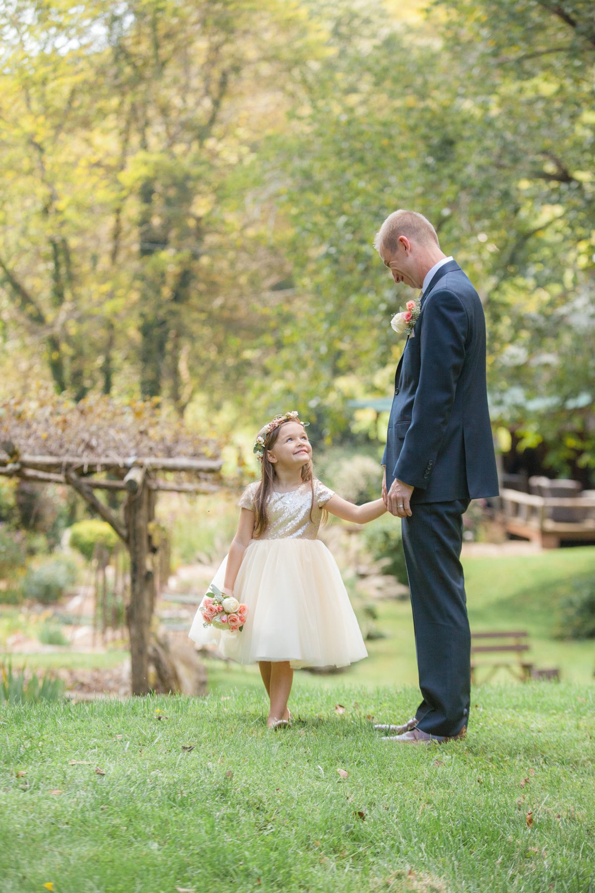 Groom and flower girl at Butterfly Hollow wedding in Gordonsville, TN / Photography by Krista Lee
