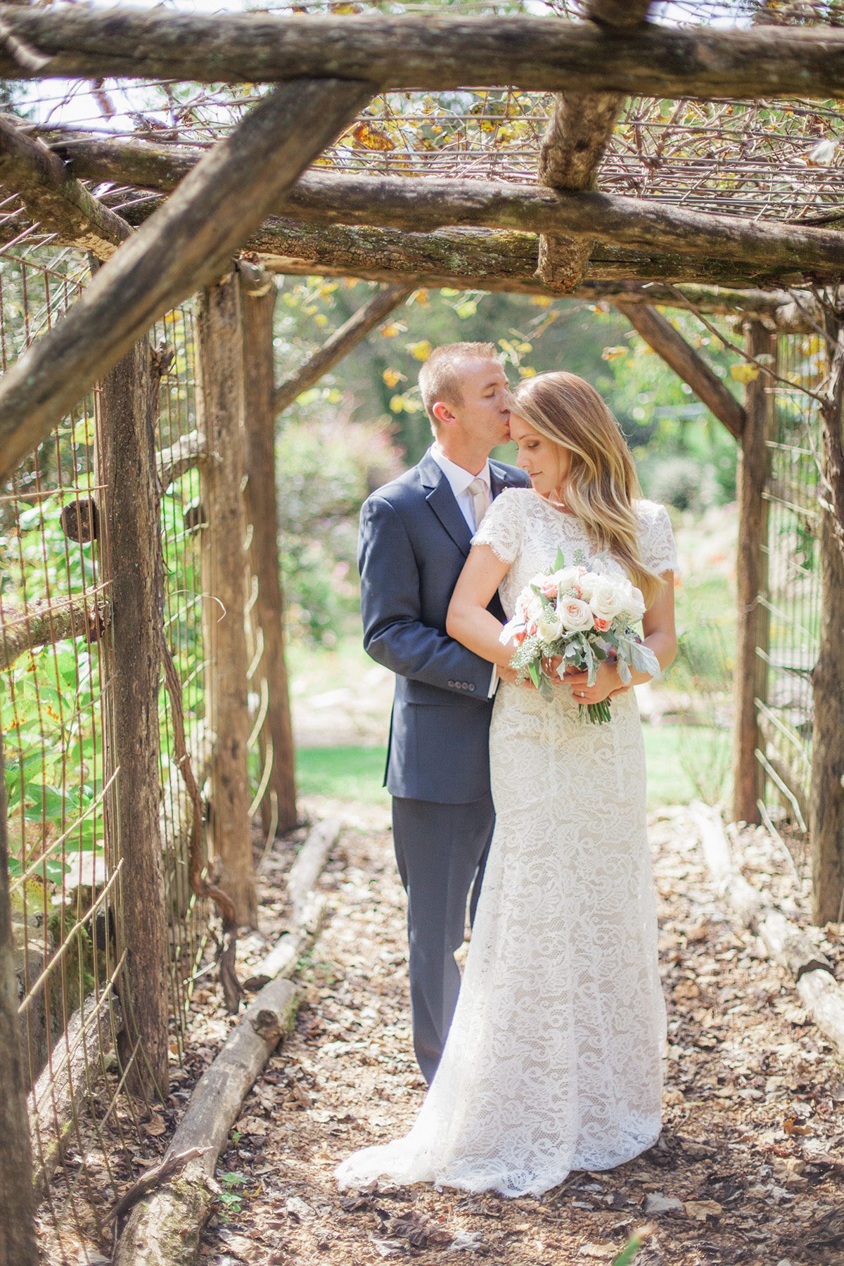 Bride and groom at Butterfly Hollow elopement wedding in Gordonsville, TN / Photography by Krista Lee