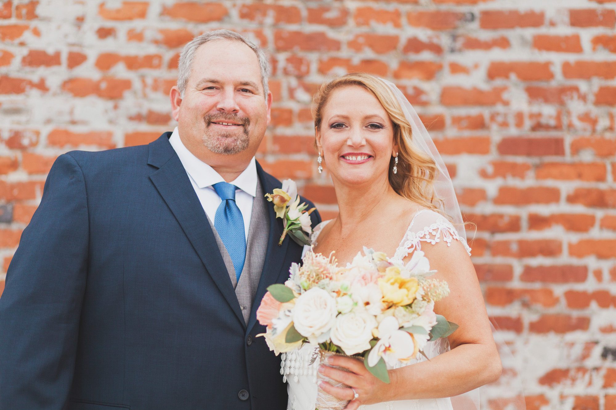 Bride and groom portrait before wedding ceremony  at Houston Station, Nashville TN. Photos by Krista Lee Photography.