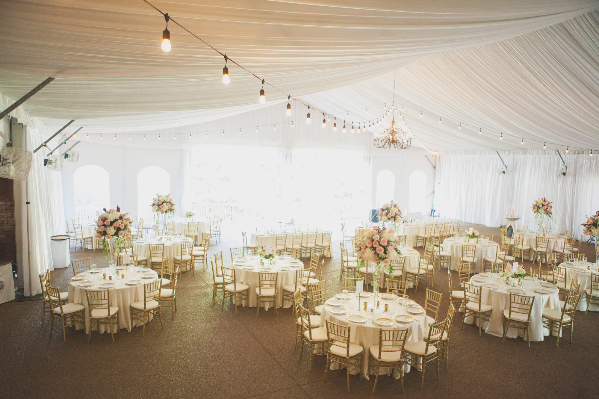 Tented reception hall behind venue at Riverwood Mansion in Nashville, Tennessee. Photography by Krista Lee.