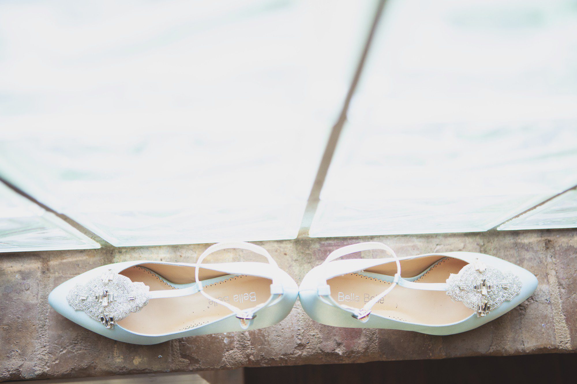 Bride's gorgeous pale blue shoes beside the vintage window at McConnell House in Franklin, TN before wedding ceremony. Photos by Krista Lee Photography Nashville, TN