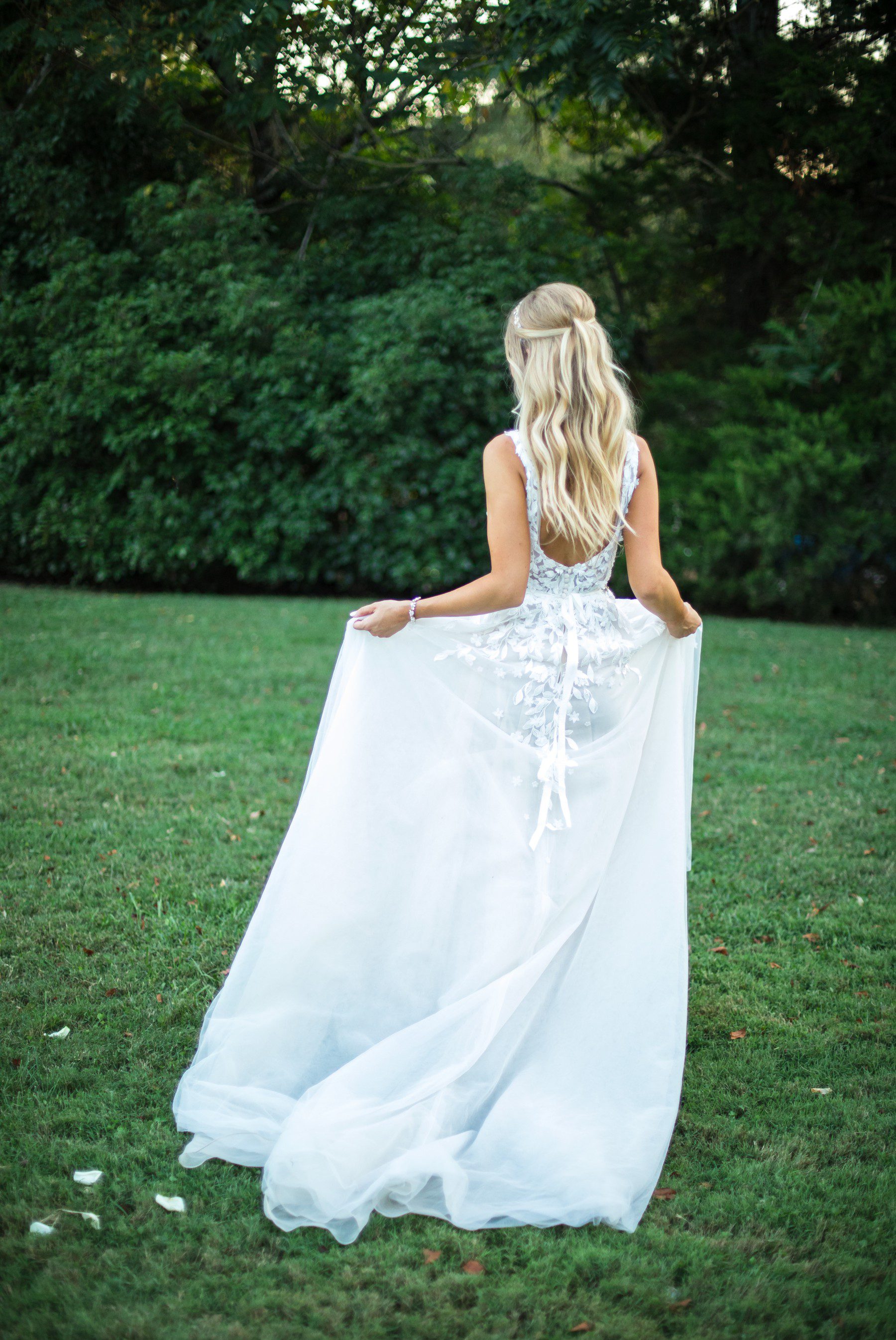 bride in BHLDN gown outside at Cedarwood weddings in nashville tn