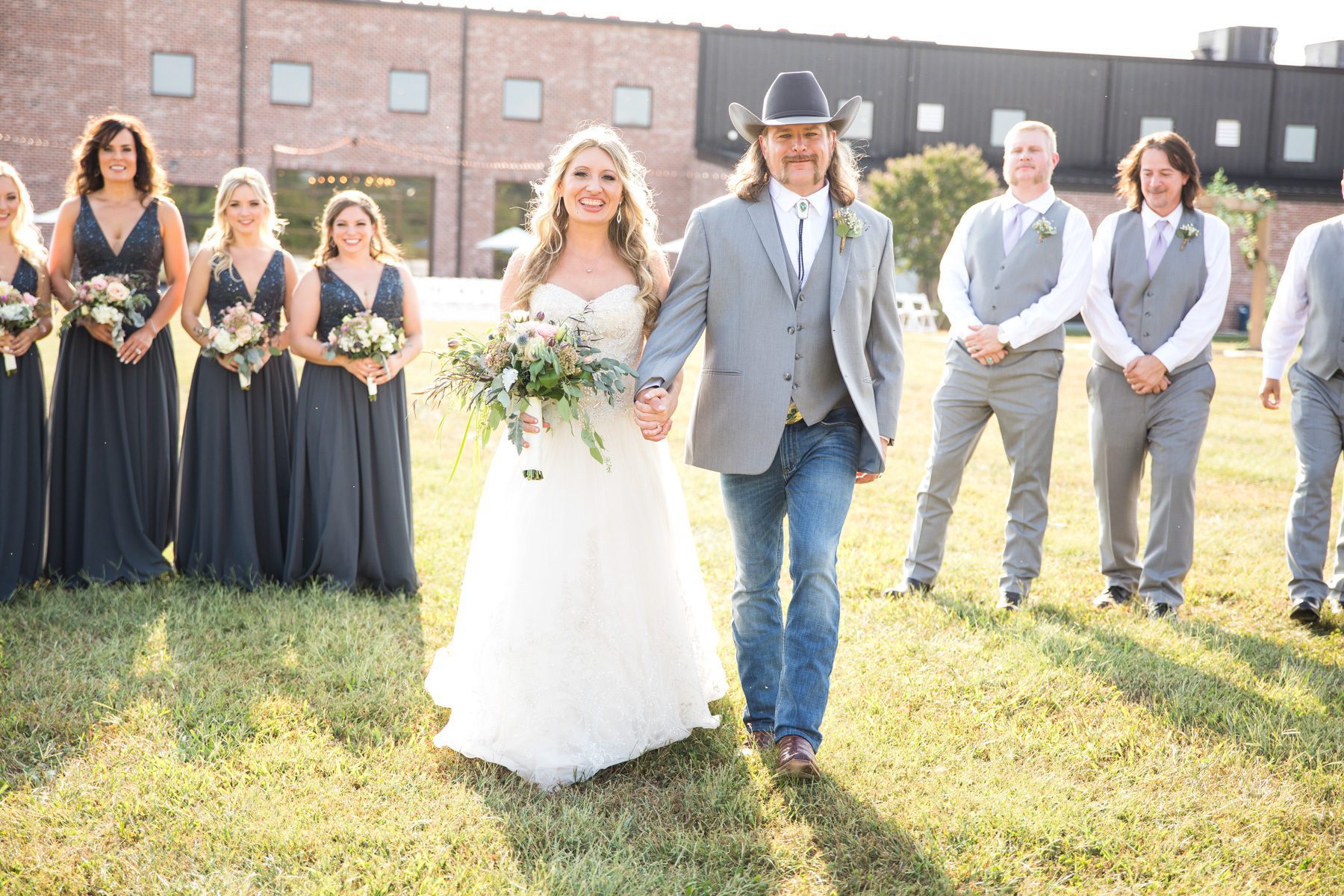 bride and groom with wedding party Old Glory Distilling Co. Clarksville, TN 