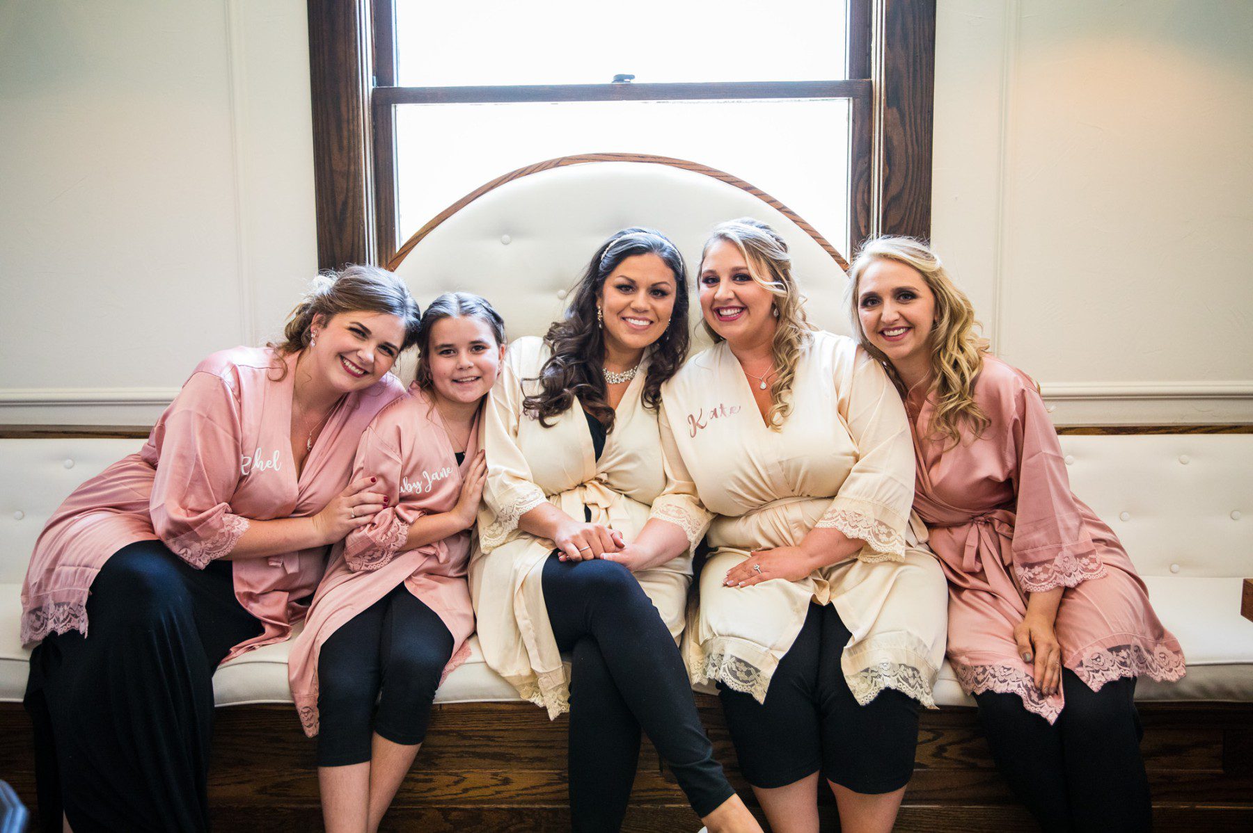 brides with bridesmaids before wedding at CJ's off the square