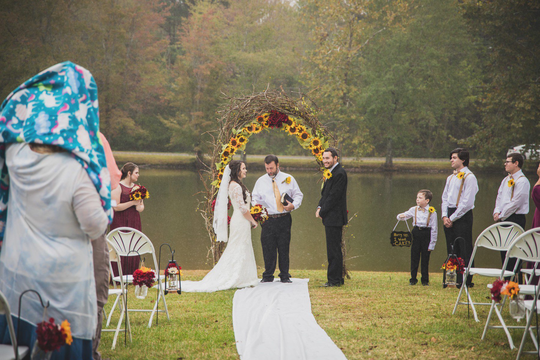 rainy day outdoor wedding ceremony Clearview Church of Christ Lyles, TN 