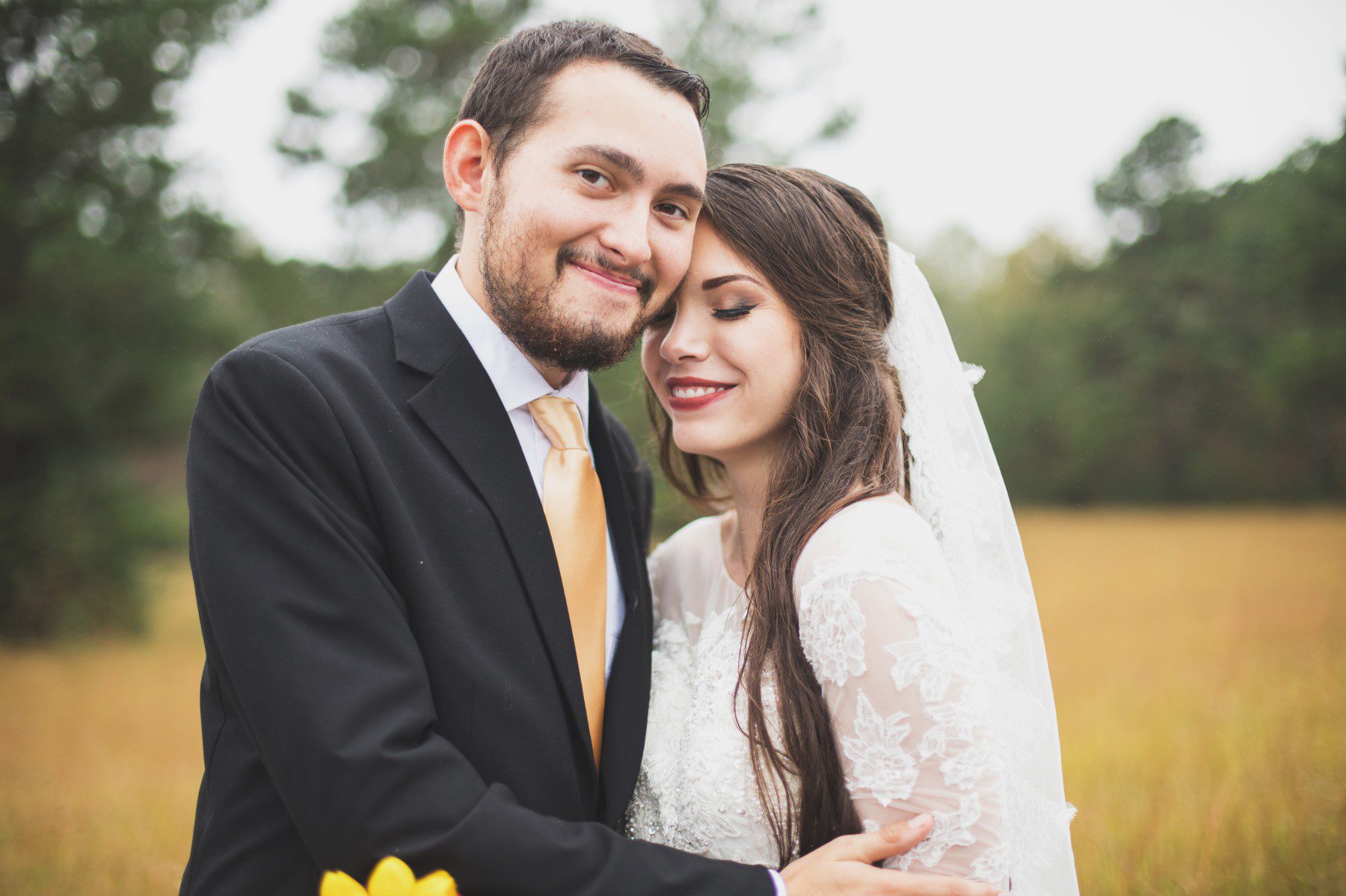 Nashville wedding photographer fall bride and groom in field 
