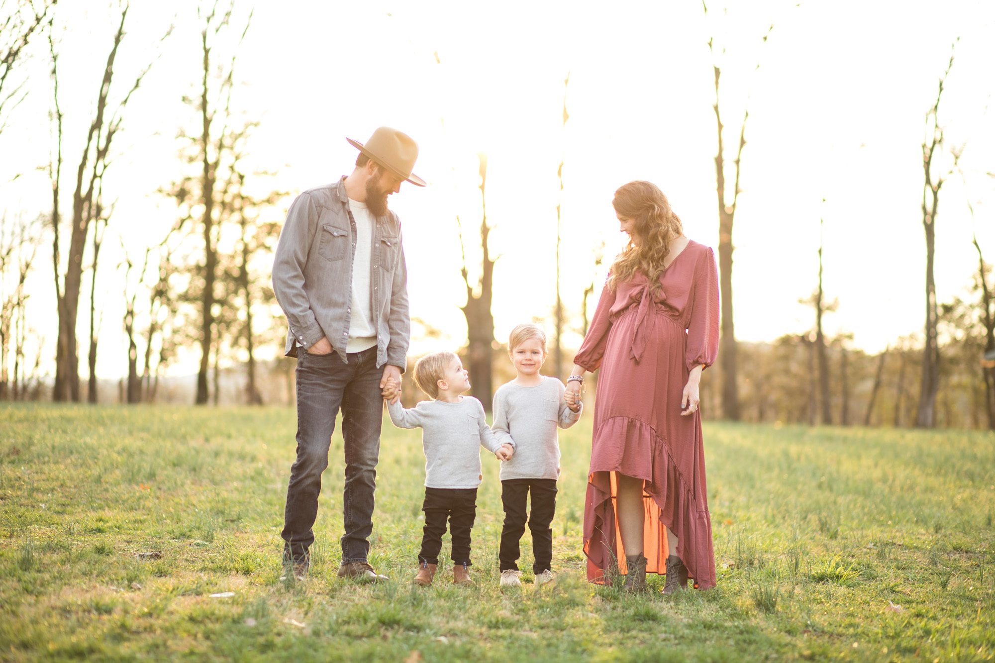 Hipster sunset family portrait maternity session in a field 