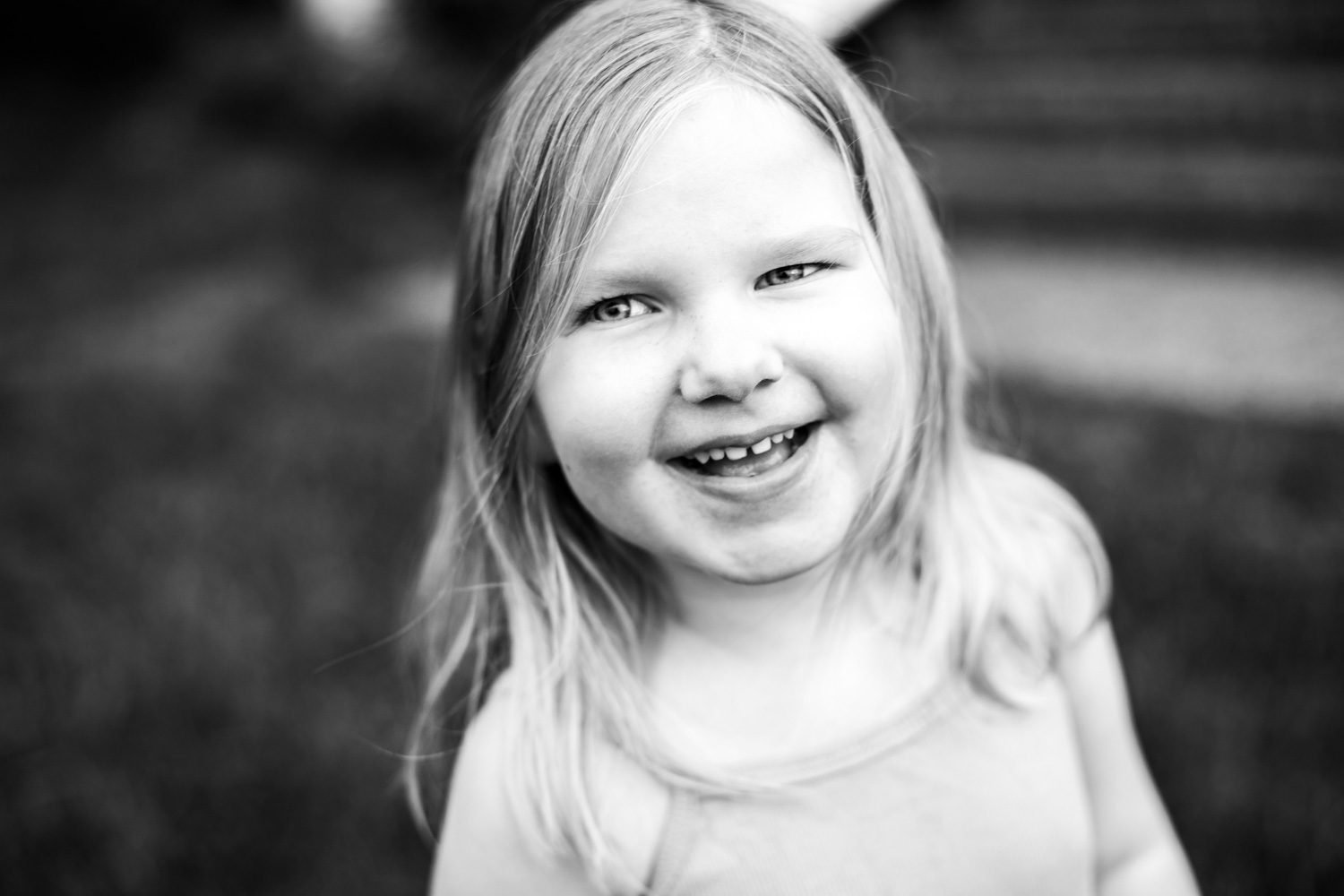black and white little girl laughing 