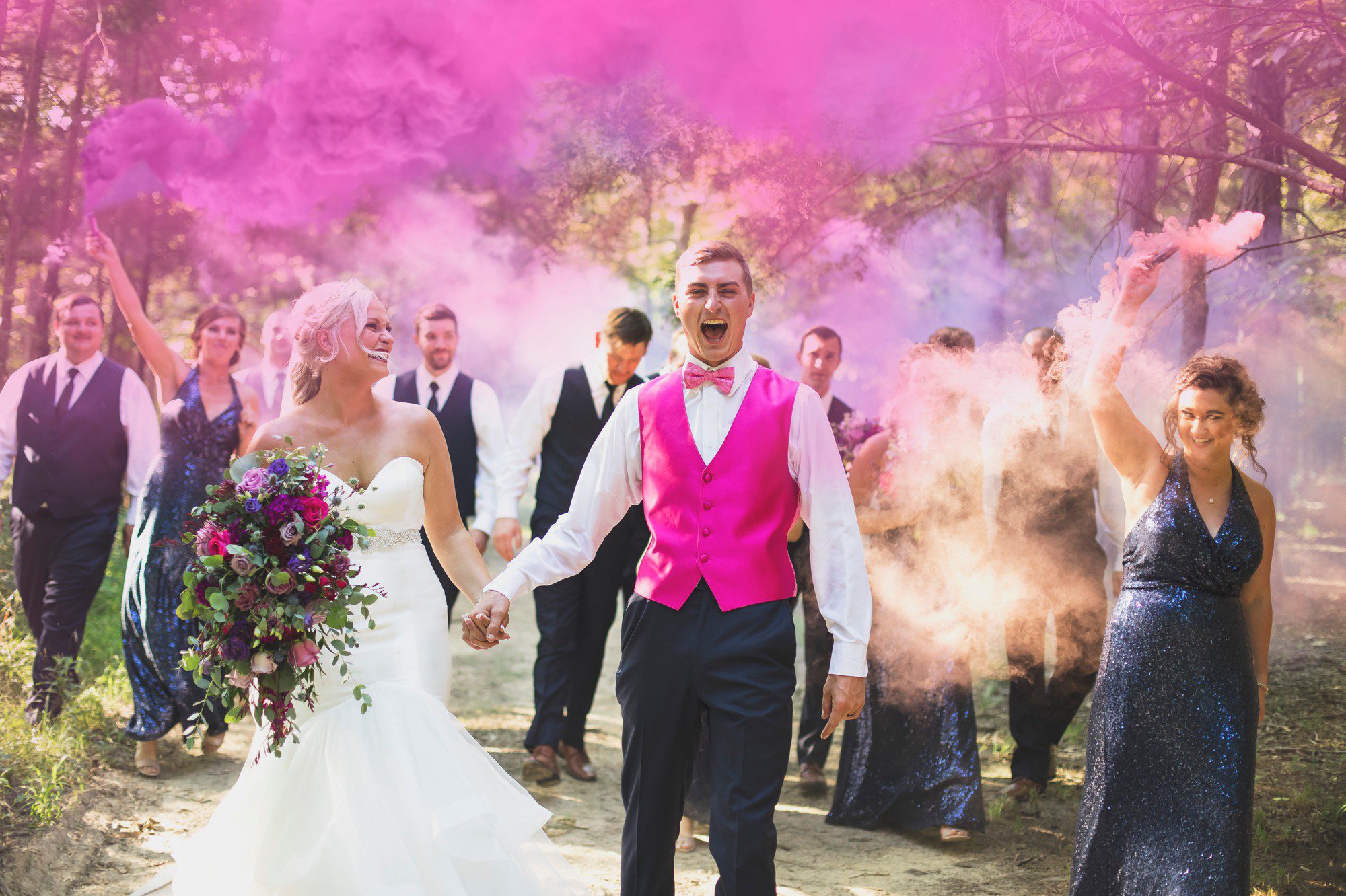 Southern wedding with pink smoke bombs