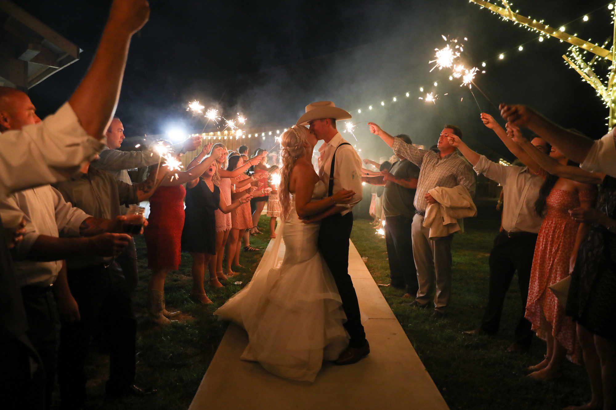 Romantic bride and groom wedding sparkler exit 