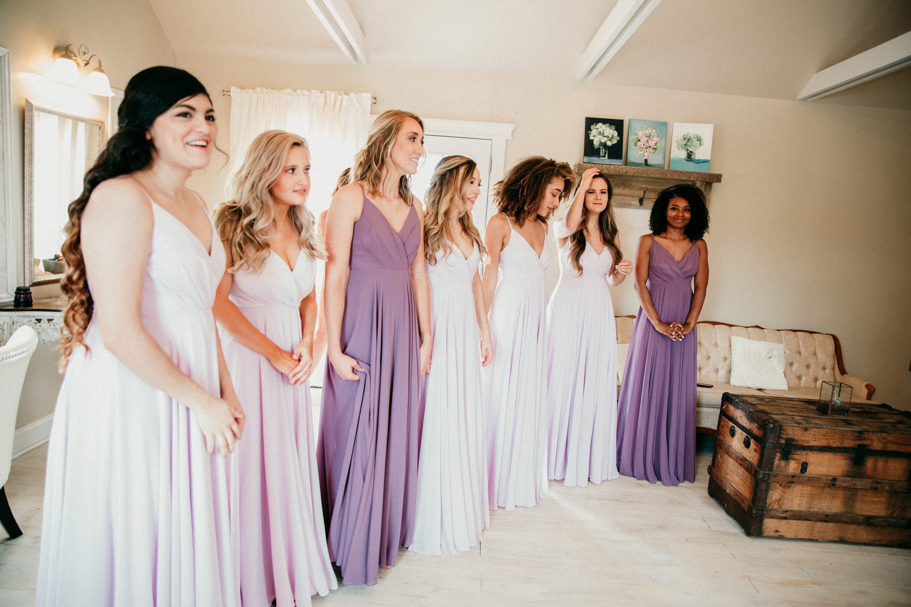 Bridesmaids wait for bride reveal on wedding day 
