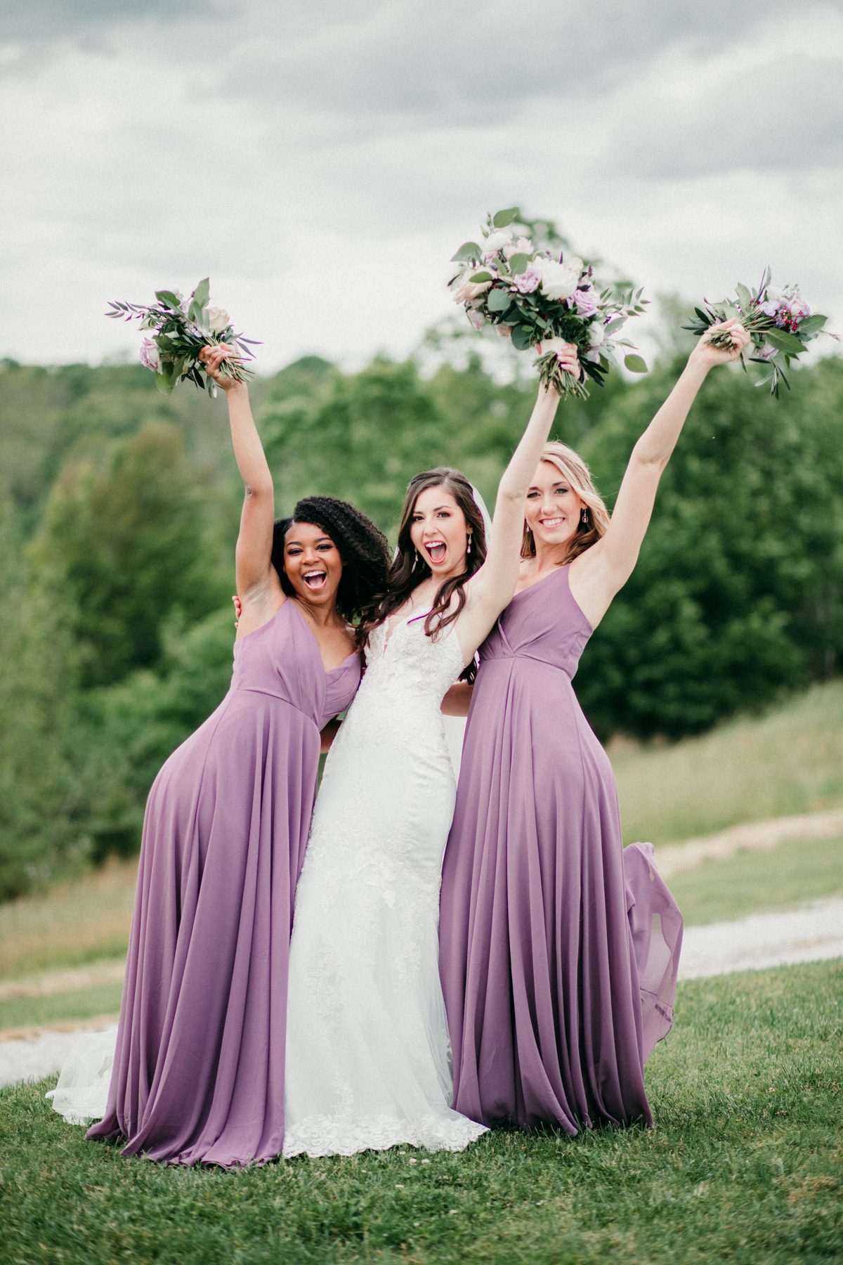 Bride with bridesmaids on wedding day 
