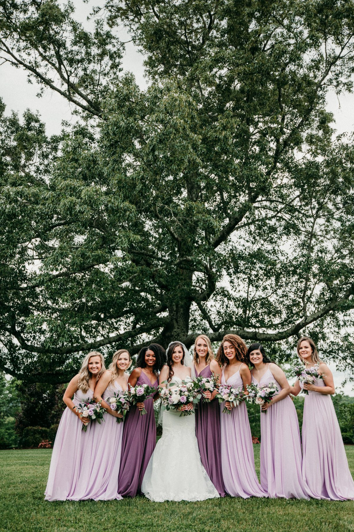 Lilac, plum and purple bridesmaid dresses