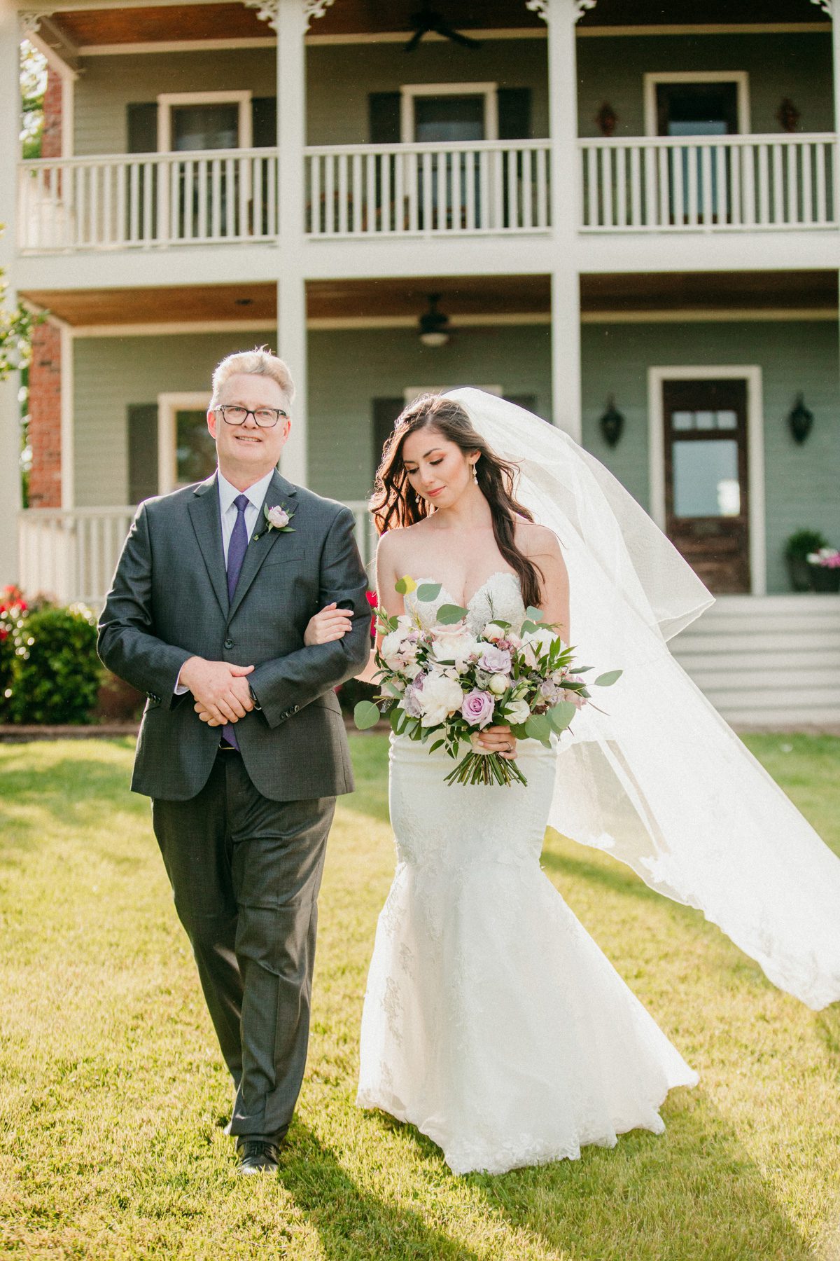 bride walks down the aisle in outdoor ceremony wedding processional 