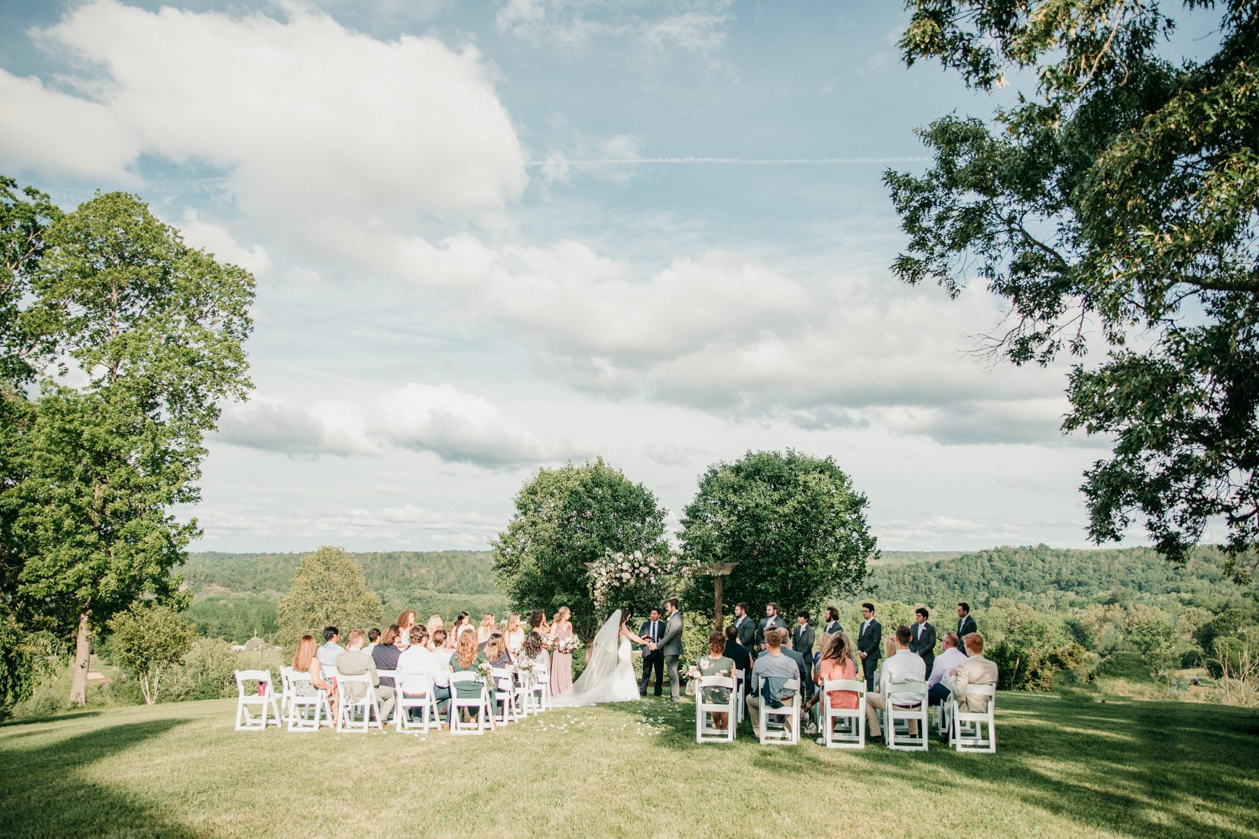 Summer outdoor wedding ceremony Front Porch Farms Tennessee 