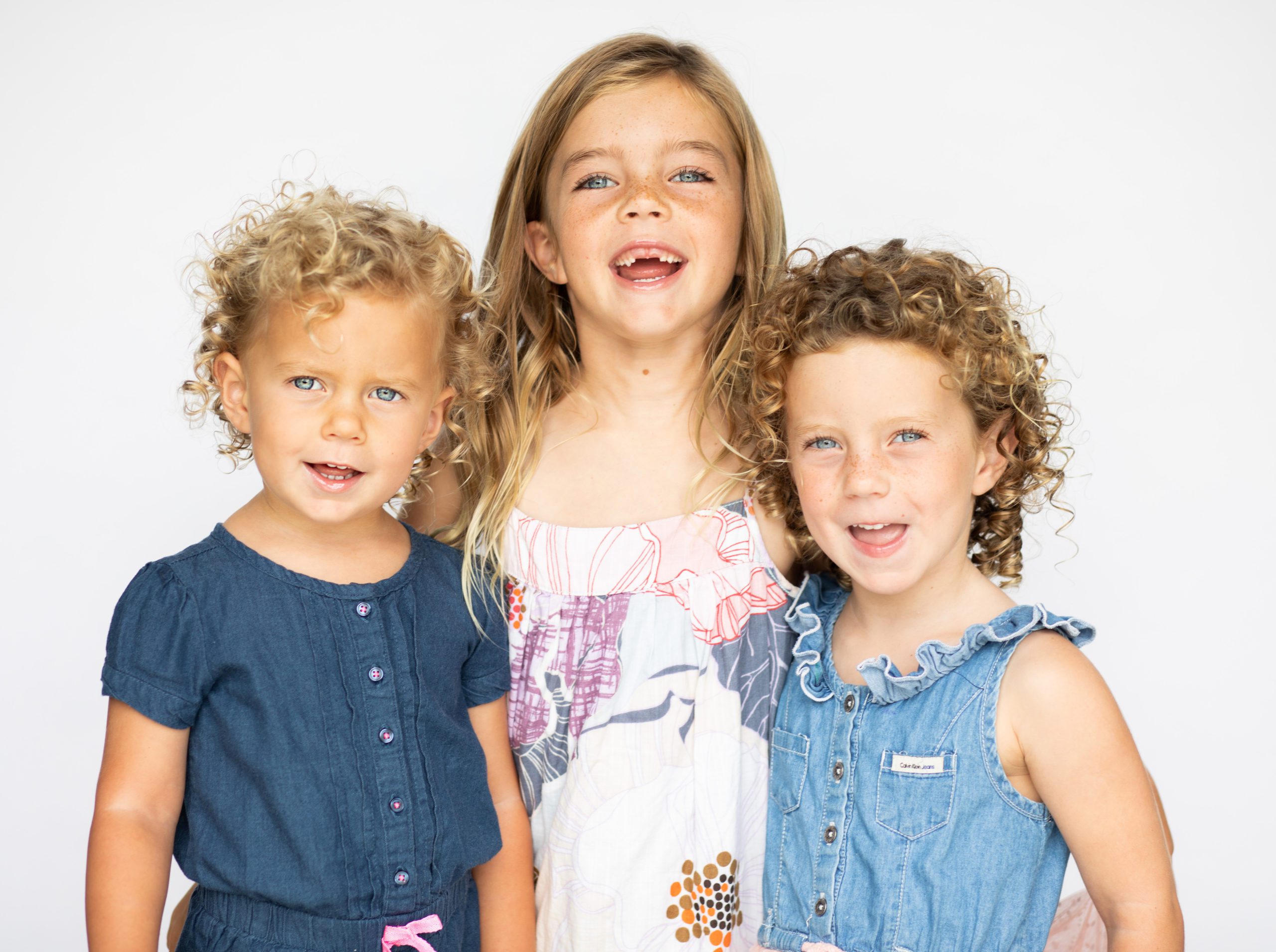 Siblings pose for a kids headshot session in Nashville TN / Block agency 