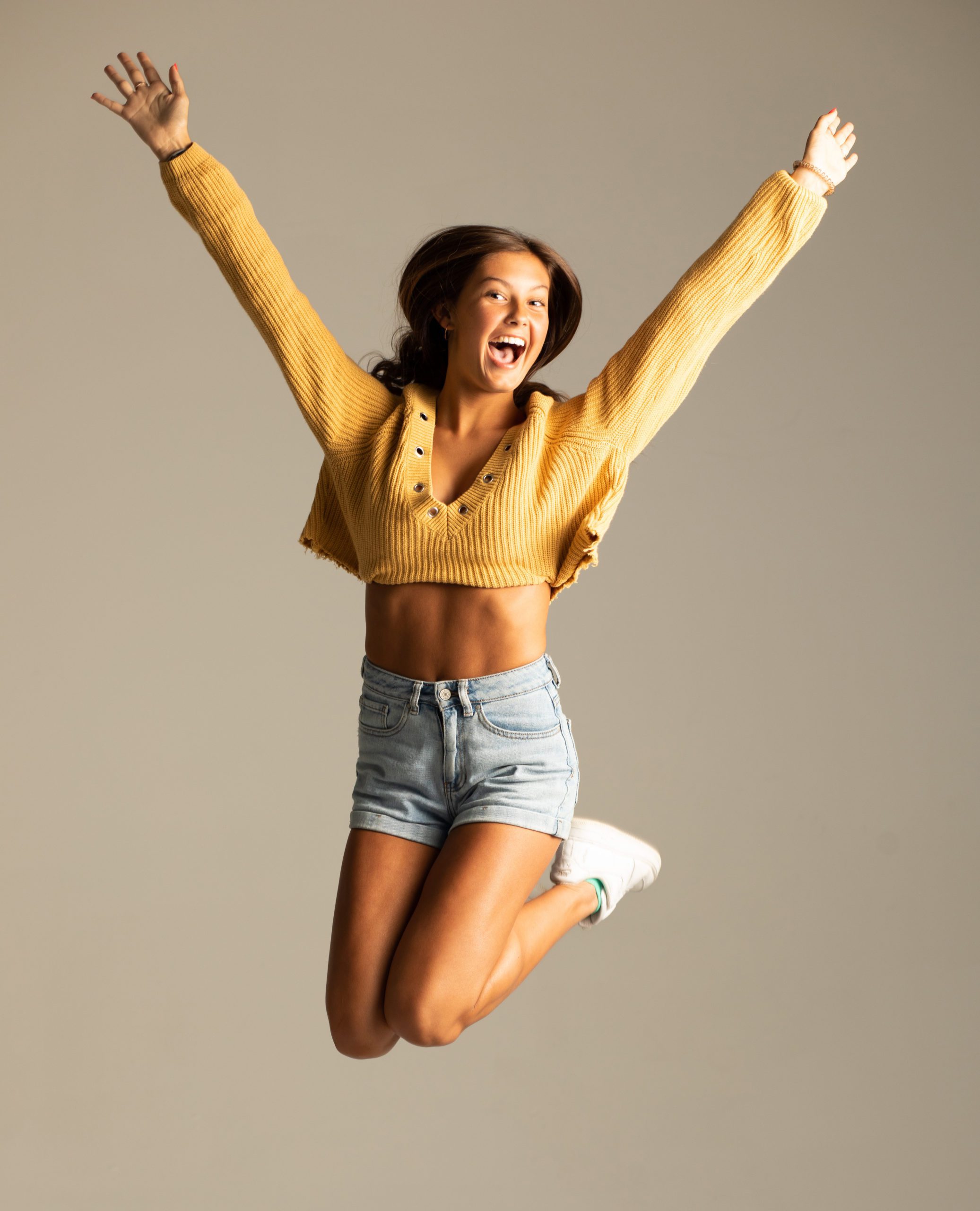 lighthearted jumping photo for modeling headshots for Chavey block agency nashville tn