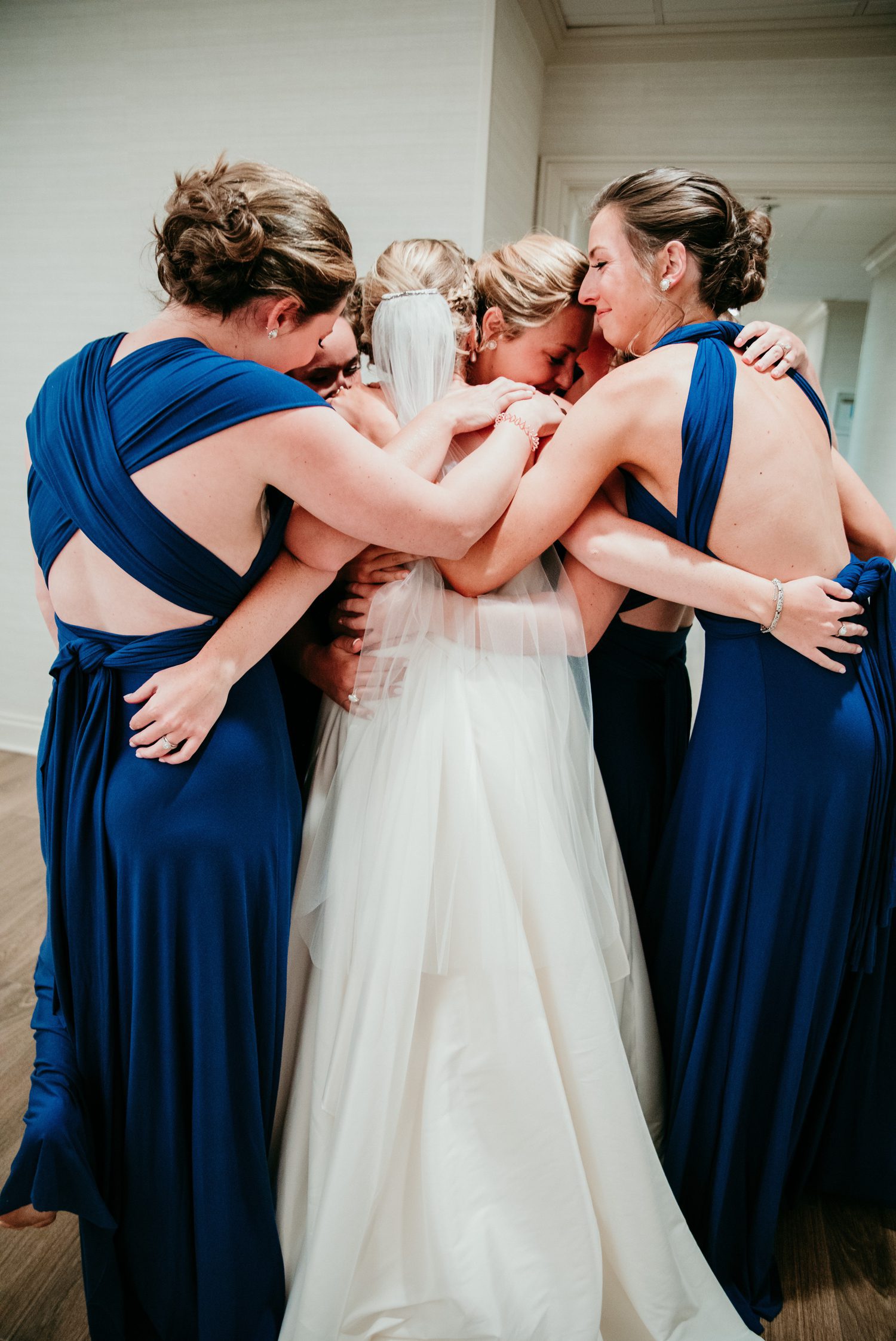 Old Natchez Country Club Wedding in Franklin, TN Bridesmaids Group Hug with Bride