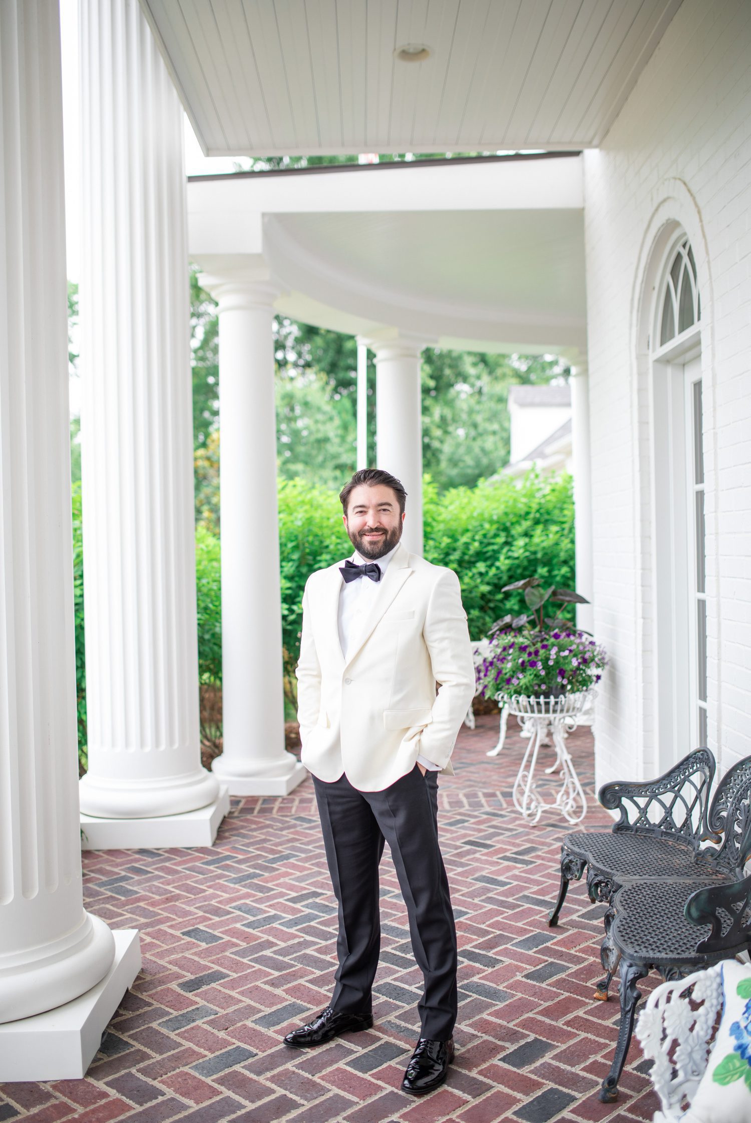 Private Estate Wedding Franklin, TN Groom on Porch with White Columns