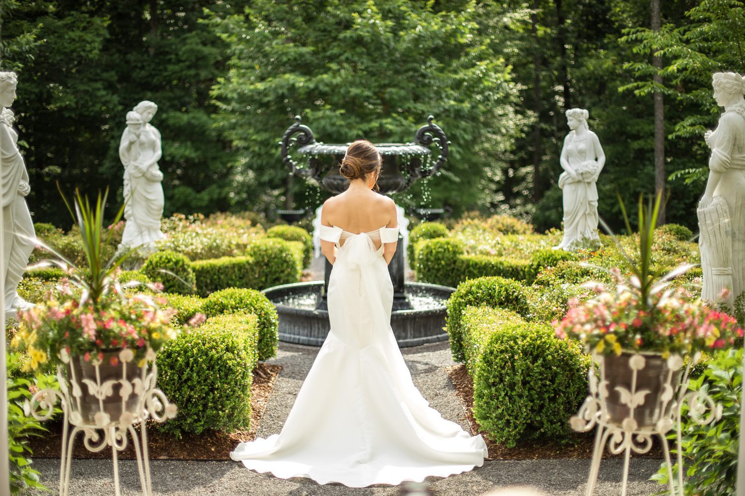 Private Estate Wedding Franklin, TN Bridal Portrait from Back in Garden with Statues