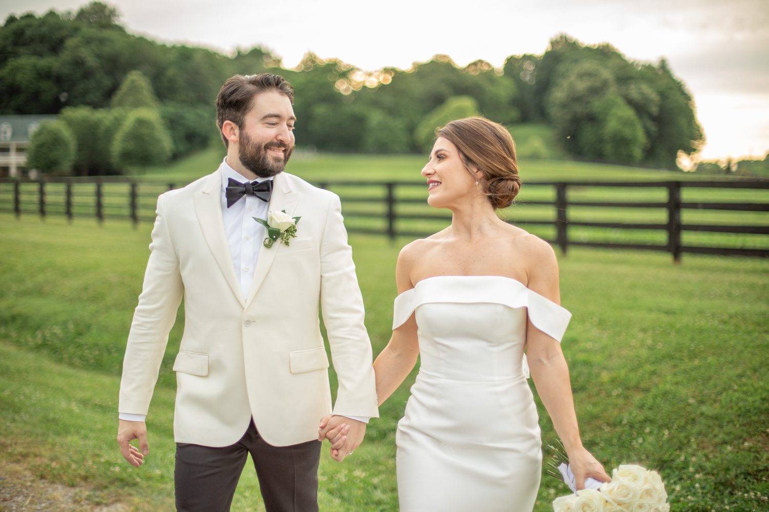 Private Estate Wedding Franklin, TN Bride and Groom Portrait in Green Field with Fence