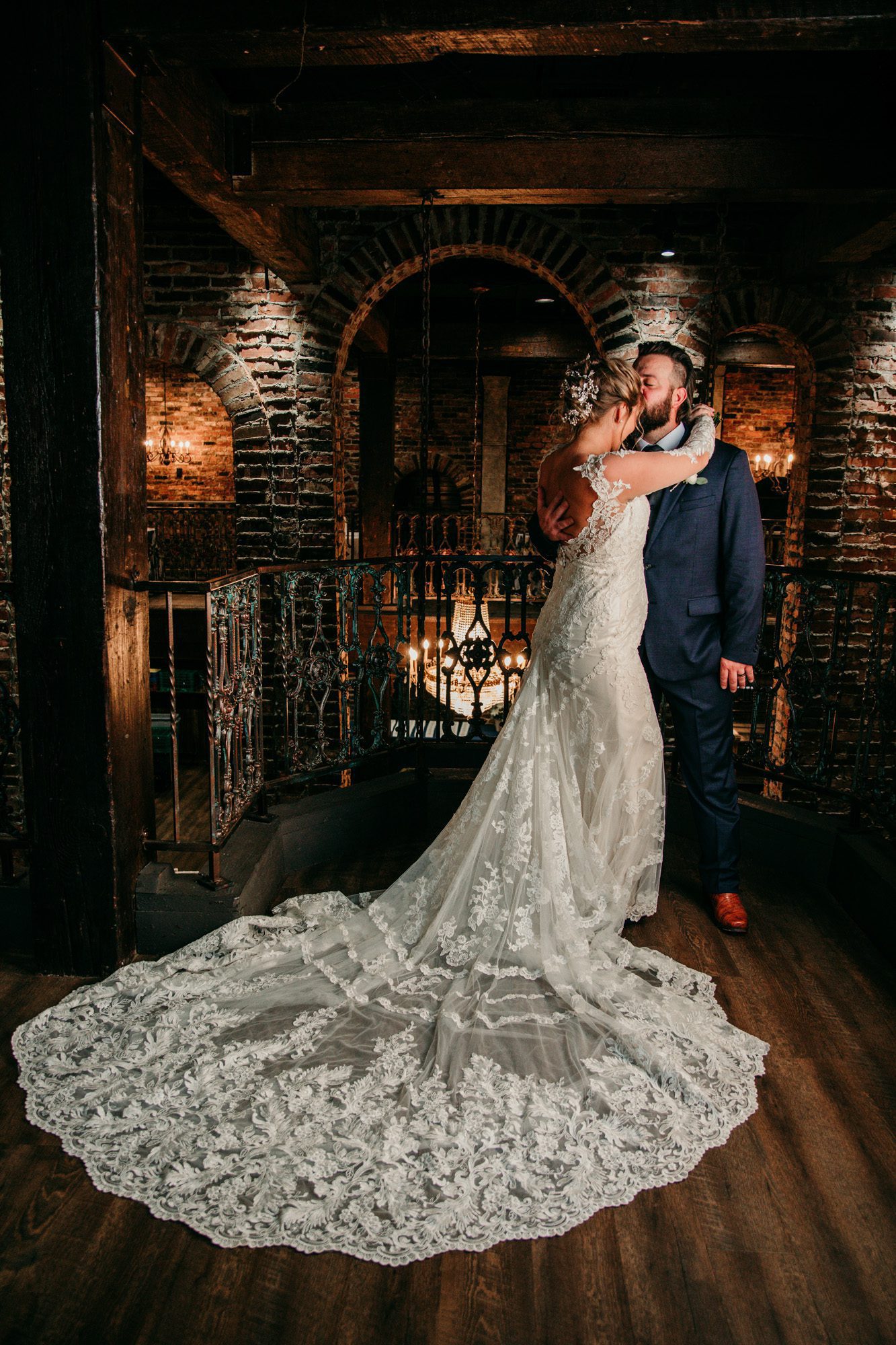 Bride and groom inside a vintage brick building old world charm at the Bedford event and wedding venue in Nashville TN. Photo by Krista Lee Photography